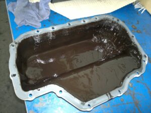 engine sludge on oil pan